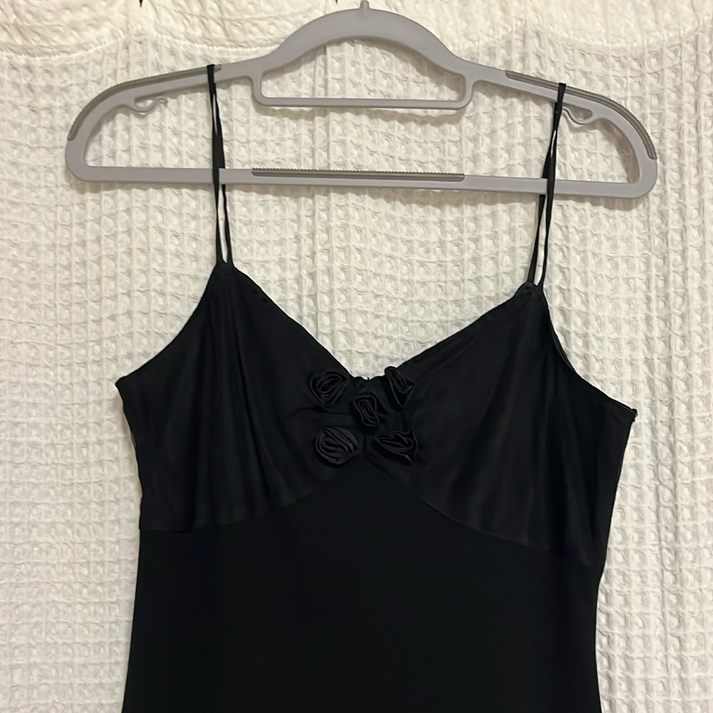 Vintage black midi dress with floral embellishment!